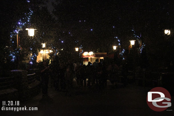 The lights dim for snowfall throughout the evening.