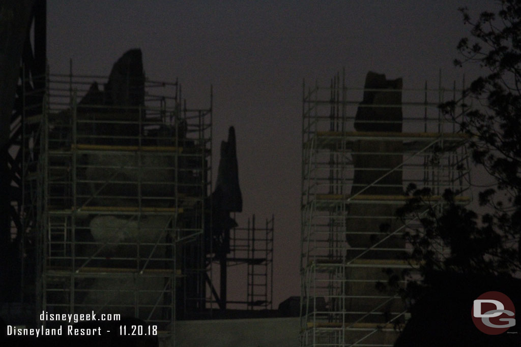 The spires of Black Spire Outpost lit up slightly by some work lights below them.