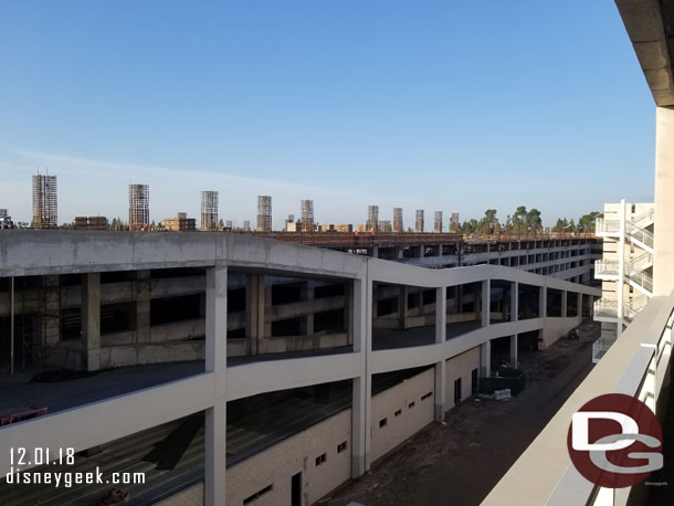 A look at the new parking structure as it marches toward completion next year.  In this wide shot you can see the work on the 5th floor on the front section and 4th floor beyond plus the roof going on the building under the ramp.