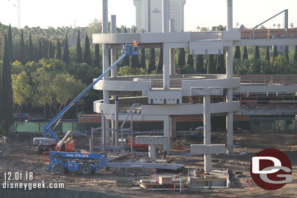 Here you can see them sealing/painting the concrete for the escalator structure.