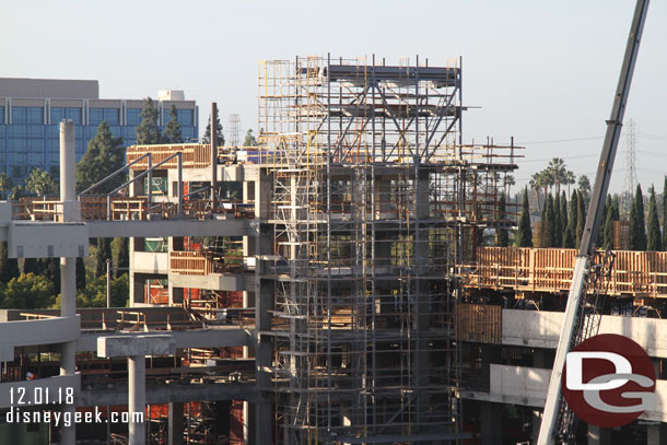 Steel on the 5th floor rising toward the roof and beyond.  Guessing for an escalator and roof structure.