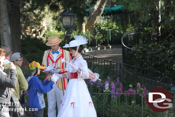 Bert and Mary Poppins greeting guests