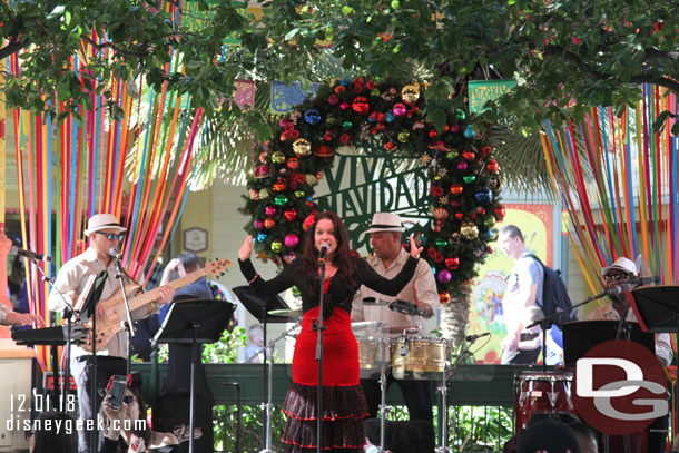 A band performing on the bandstand this afternoon