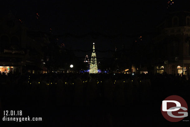 All the lights on Main Street were off and you can see the lights of the singers making their way toward