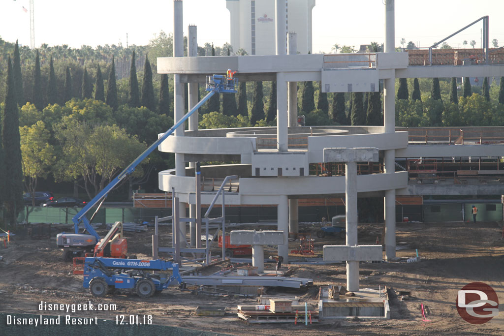 Here you can see them sealing/painting the concrete for the escalator structure.