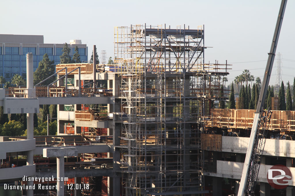 Steel on the 5th floor rising toward the roof and beyond.  Guessing for an escalator and roof structure.