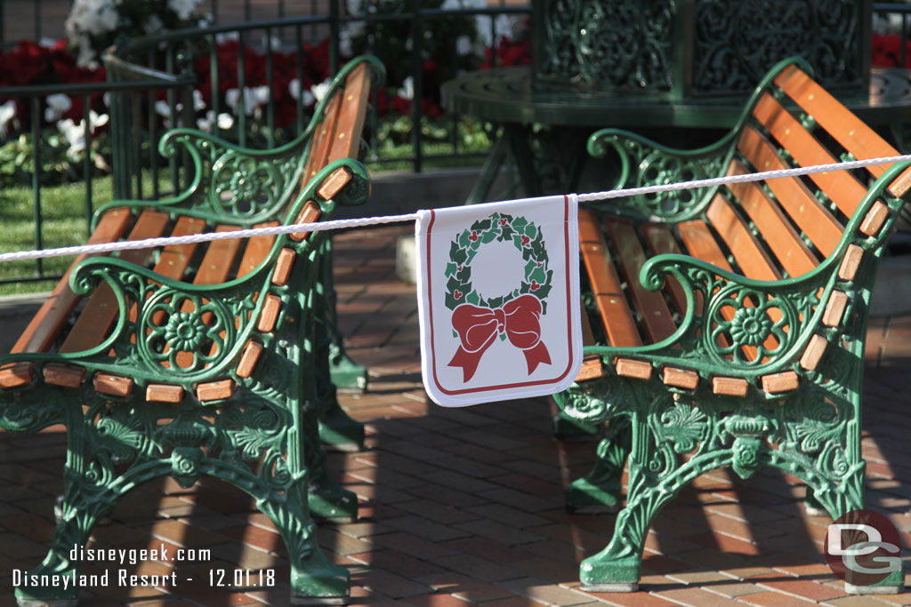 Reserved benches for this evening.  The other side had a half dozen standby benches that were claimed at park opening.