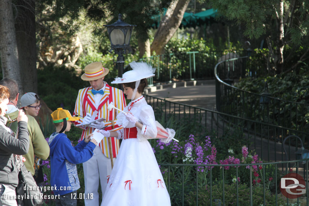 Bert and Mary Poppins greeting guests