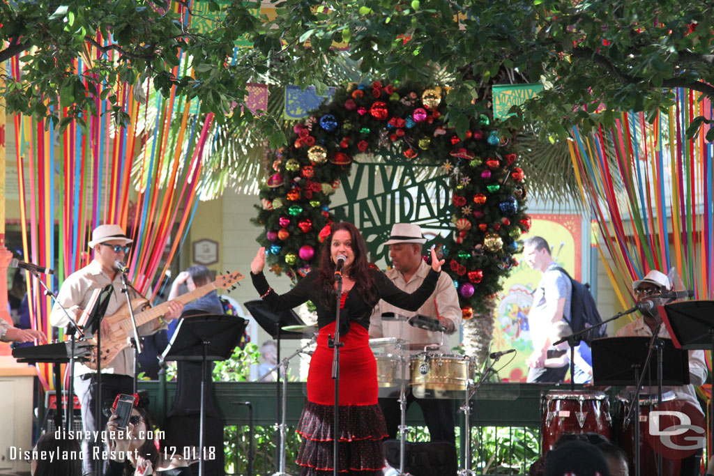 A band performing on the bandstand this afternoon