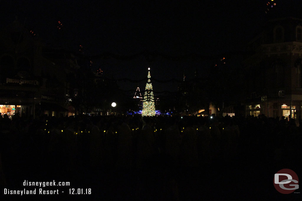 All the lights on Main Street were off and you can see the lights of the singers making their way toward