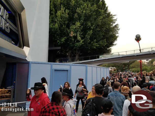 Work on the planter near the Star Tours FastPass return queue.