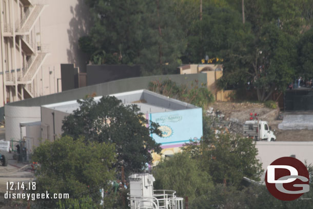 The restroom building and some trees around it are still there.