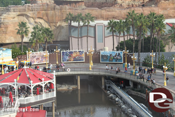 A look at the recently changed billboard arrangement on Pixar Pier.  They shortened the wall so you can better see the Incredicoaster station and a glimpse of Edna