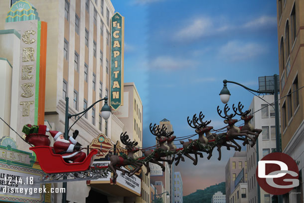 Santa flying over Hollywood Blvd.