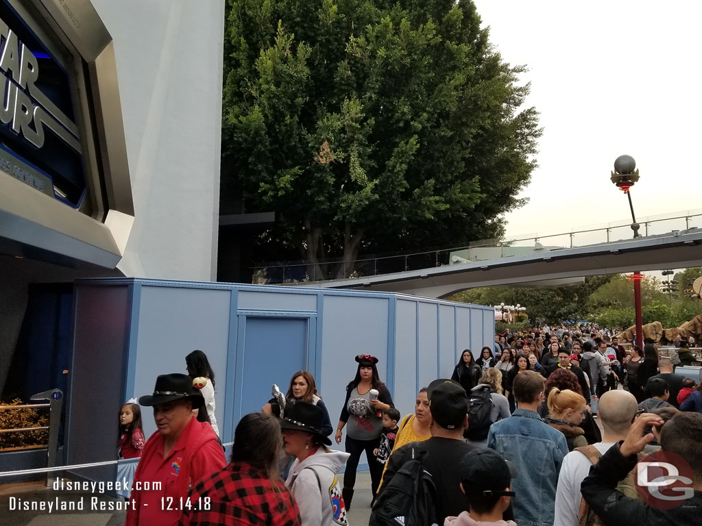 Work on the planter near the Star Tours FastPass return queue.