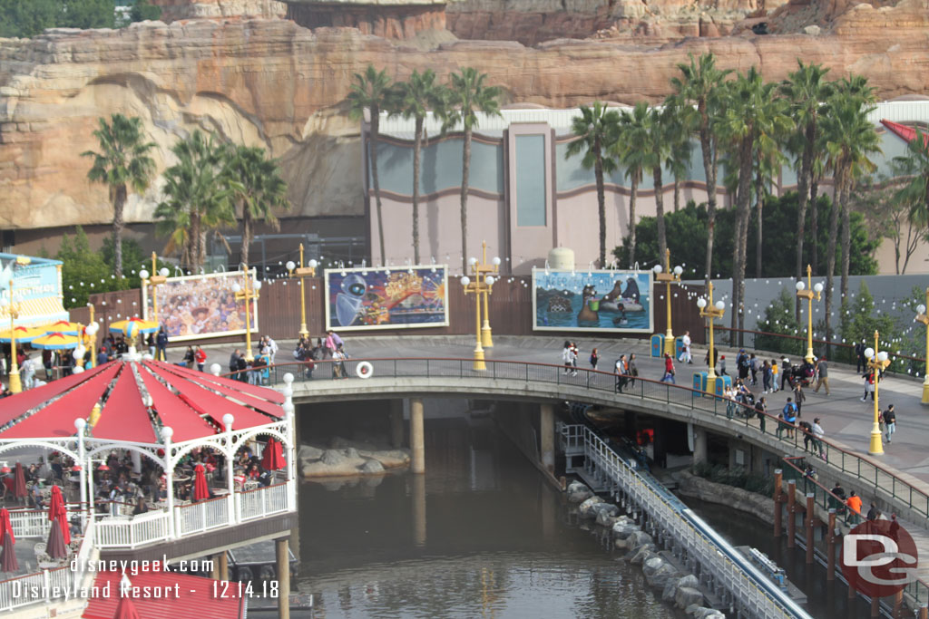 A look at the recently changed billboard arrangement on Pixar Pier.  They shortened the wall so you can better see the Incredicoaster station and a glimpse of Edna