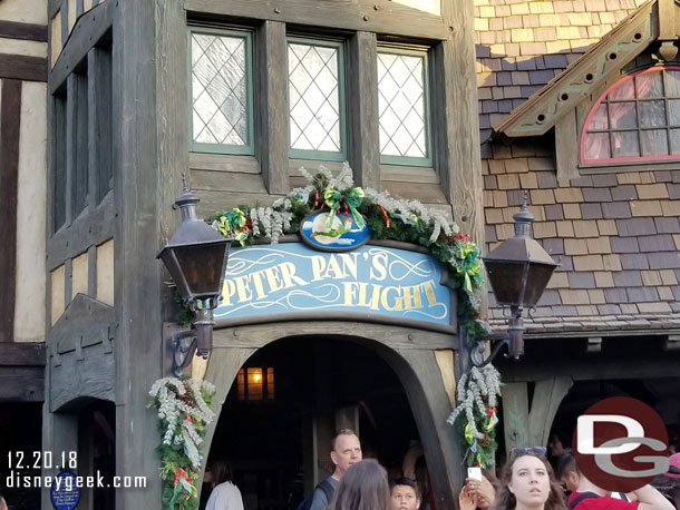 Peter Pan's Flight has a string of garland for the season.