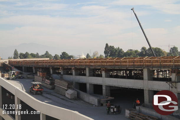 As I pan to the left toward the front of the structure you can see supports rising up for the 6th floor (the roof level).