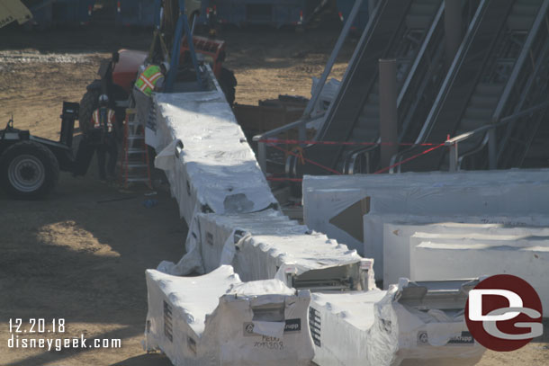 A closer look at the escalator segments on the ground.