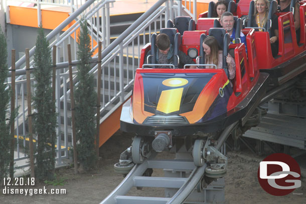 An Incredicoaster train pulling out.