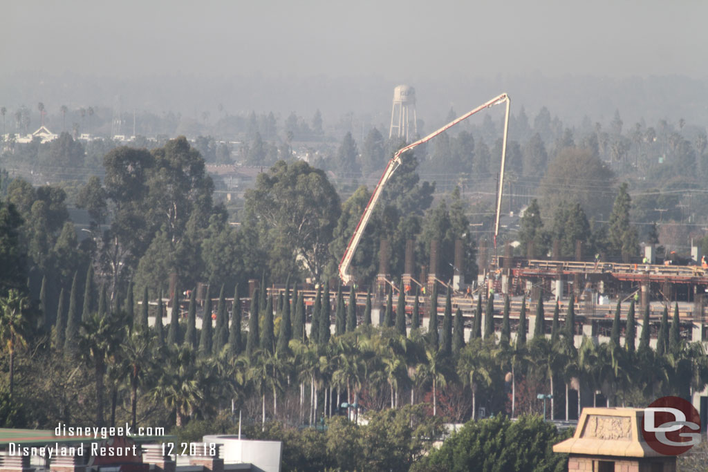 Crews were still pouring concrete at the parking structure.