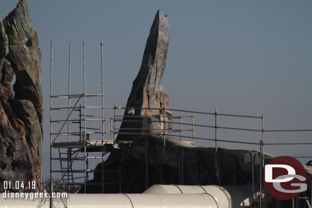 A level of scaffolding and the support toothpicks are removed.  You can see the patch still, they have not finished it yet.