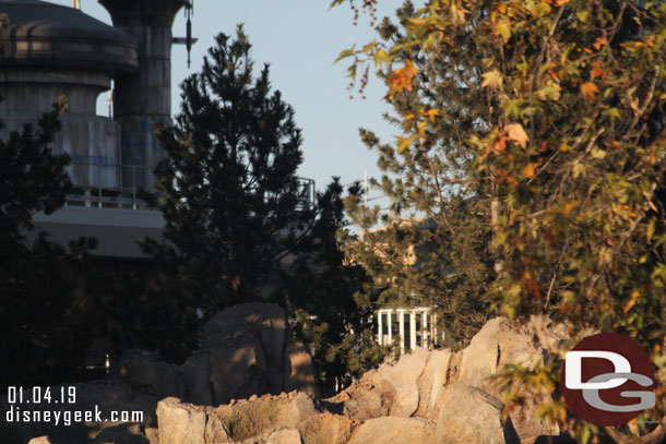 on the lower right you can see part of a new structure through the trees.