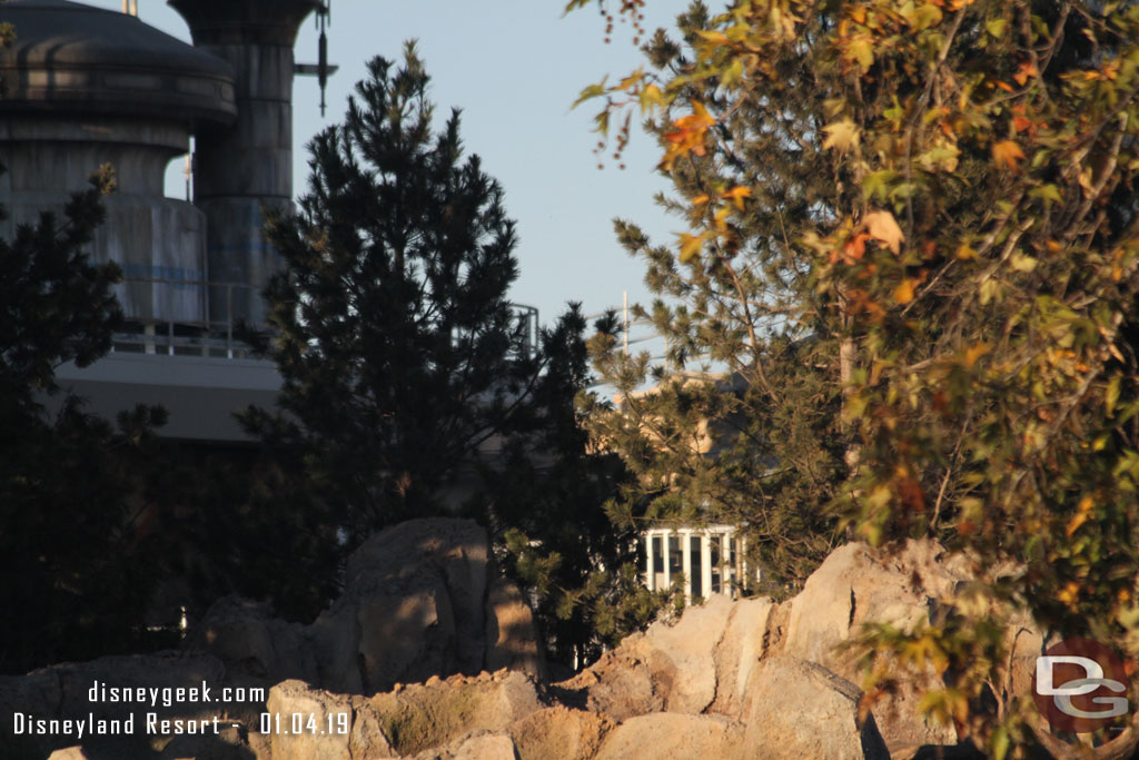 on the lower right you can see part of a new structure through the trees.