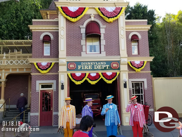 The Dapper Dans of Disneyland performing in front of the Fire Station.