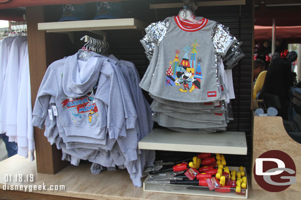 Some Get Your Ears On merchandise at the carts along the performance corridor. 