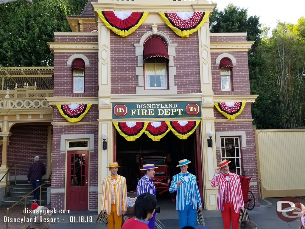 The Dapper Dans of Disneyland performing in front of the Fire Station.