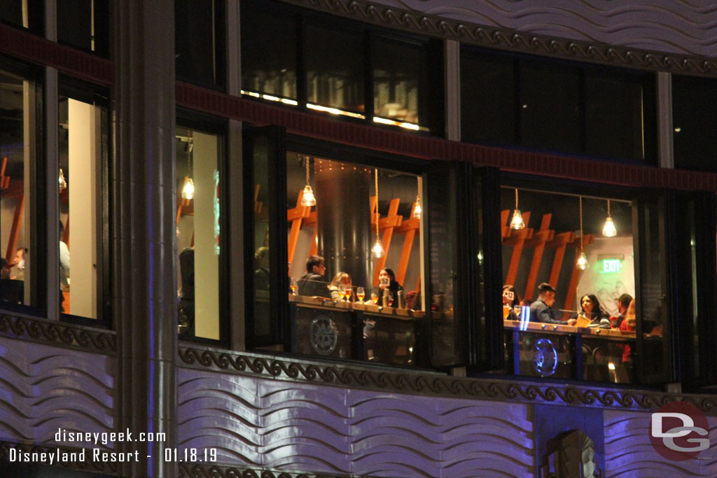 Guests at the counter overlooking Downtown Disney