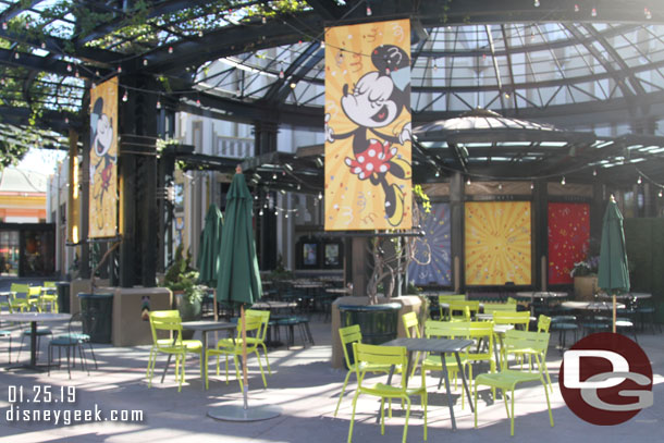 The food truck seating area in front of the former AMC is decorated for the Get Your Ears On Celebration.