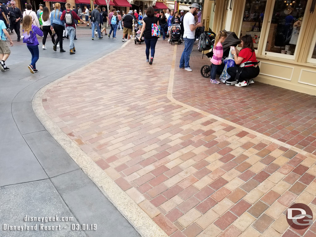 There is now a larger flat area to ease the transition from walkway to street.