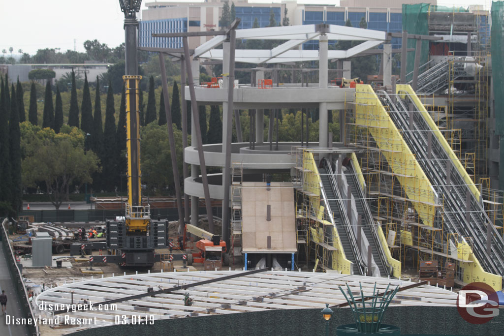 The supports for the roof structure have been lifted into place but the main section is still on the ground.