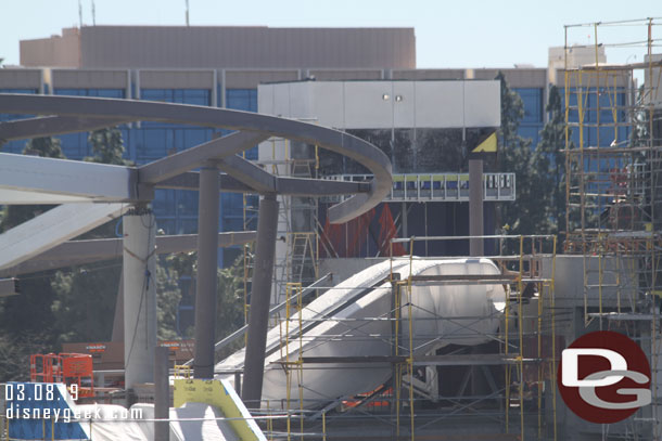 Scaffolding is coming down from the far elevator structure.