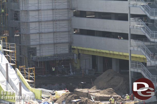 A lot of conduit being worked on at ground level.