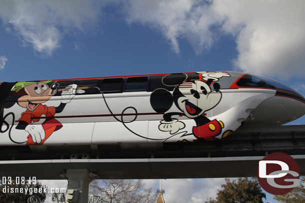 Monorail Orange passing by.