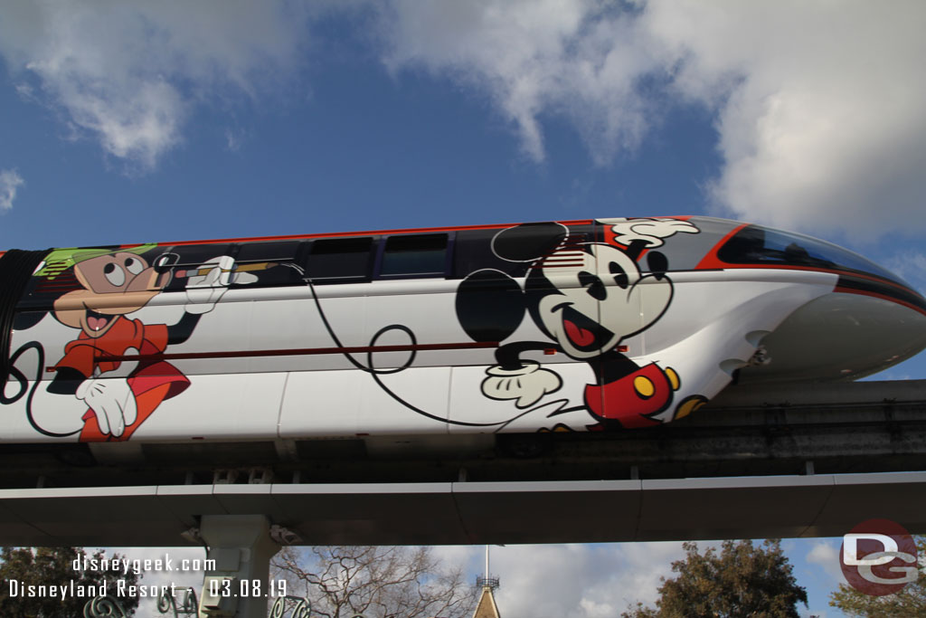 Monorail Orange passing by.