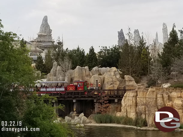 A train from the Disneyland Railroad steaming by.