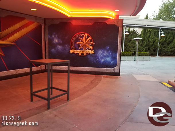 The former temporary Captain Marvel Meet and Greet background is still up but tables for the lounge are in the area now.
