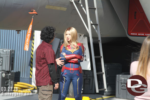 Captain Marvel meeting a guest.