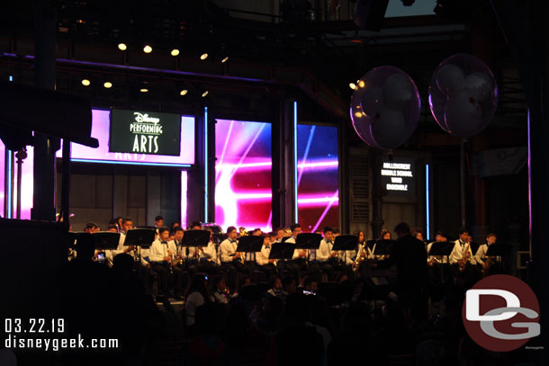 Hollencrest Middle School Wind Ensemble performing on the backlot stage.