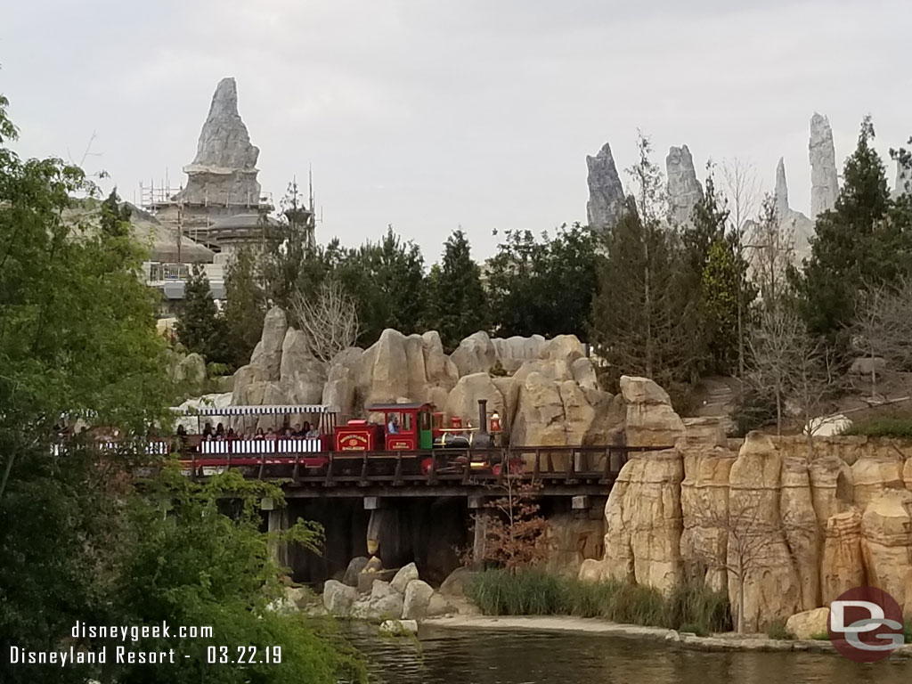 A train from the Disneyland Railroad steaming by.