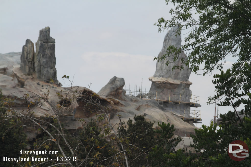 The top several stories of scaffolding are now removed from this last large formation that is being completed.
