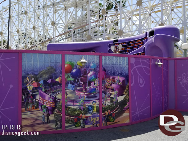 In the foreground the concept art for the attraction.