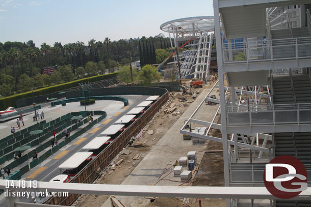 Looking out over the tram stop area.  A strip of concrete has been poured near the Pixar Pals structure.