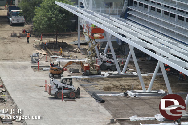 More curbs and landscaping going in at the top of the frame.