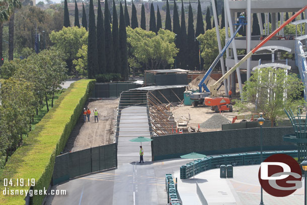 A better view of the temporary walkway on what will eventually be the tram way.  Notice the team on the left and that portion has been cleared already.