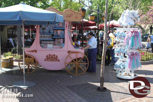 The cart that usually near the castle has been set up in the stroller parking area near Pinocchio in Fantasyland.